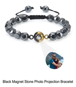 Detail of 6mm tiger eye photo projection bracelet with adjustable black braided rope