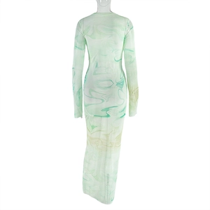 Detail view of the green marble print on a slim-fit long-sleeve maxi dress back