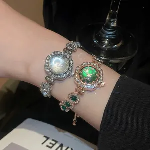 Luxury rhinestone encrusted round watch bracelet with vintage charm for women