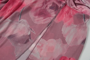 Detail of pink floral print on breathable mesh fabric with premium stitched hem edges