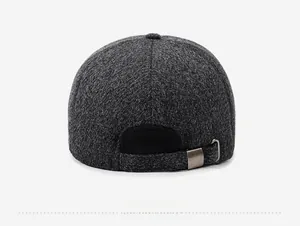Detail view of the gray wool baseball cap featuring an adjustable metal buckle strap