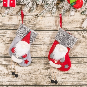 Christmas gnome stocking hanging ornaments in red and gray plush for holiday decor