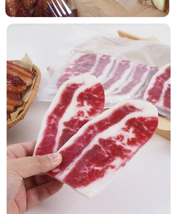 Close-up detail of artificial marbleized beef slice model with realistic texture