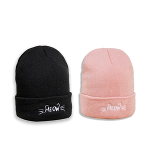 Chic MEOW cat ears knitted beanies in black and pink for winter warmth and fashion