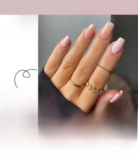 Short square light pink press-on nails featuring delicate white and yellow floral patterns