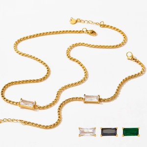 Detail of vacuum-plated gold chain necklace with rectangular zircon and lobster clasp