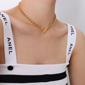 Chunky 18K gold plated stainless steel chain necklace featuring a bold front OT toggle clasp