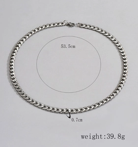 Close-up of silver Cuban link chain with detailed length, width and weight specifications