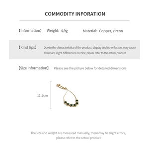 Detail view of gold-plated copper bracelet with green zircon and 11.5cm length info
