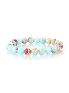 Detailed macro view of beaded natural stone bracelet with blue and jasper textures