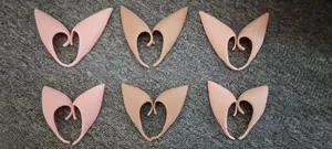 Detailed set of six pairs of silicone elf ears in various skin tones for cosplay costumes