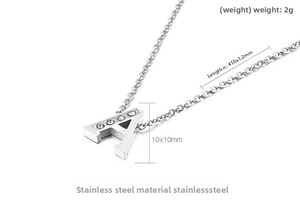 Close-up of silver stainless steel necklace with crystal letter A pendant and chain specs