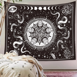 Detail of occult gothic tapestry with star and skull hanging above a bedroom headboard