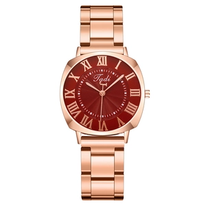 Elegant rose gold women's watch featuring a red sunray dial and Roman numeral markers