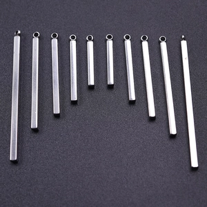 Detailed set of 11 minimalist silver stainless steel vertical bar pendants in various lengths