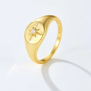 Minimalist S925 sterling silver gold ring featuring a star-set round cubic zirconia stone