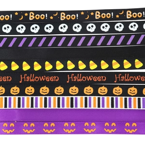 Macro shot of 10mm Halloween ribbons with skulls, pumpkins and Boo patterns