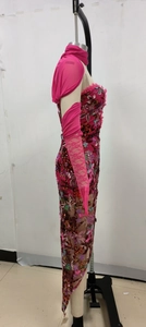 Detail of rose red sequin lace evening gown with matching tulle shawl and lace sleeves