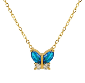 Close-up of golden butterfly pendant with blue and clear zircon crystals on thin chain