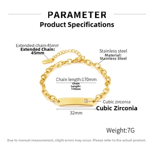 Detail view of 32mm curved gold-plated stainless steel bar bracelet with a small zircon stone