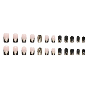 French style press-on nails set in nude pink and black with gold glitter V-shape designs