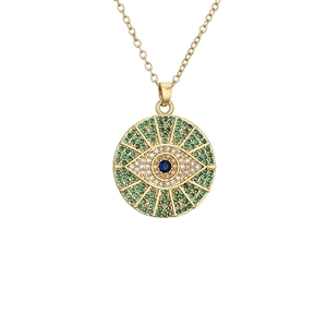Gold Evil Eye pendant necklace with blue and green micro-pave zircons on white background
