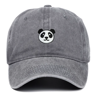 Close-up of the panda face embroidery on a dark grey washed cotton baseball cap