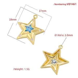 Copper gold-plated star pendant with blue center stone and white cz accents