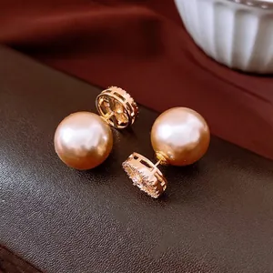 Elegant 14k gold plated zircon and pearl stud earrings in a luxury retro palace style