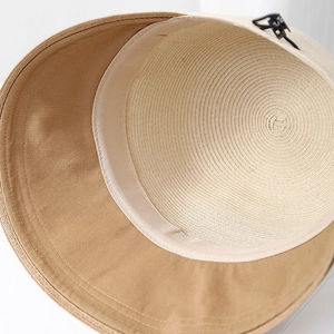 Internal view of woven straw sun hat with premium khaki lining and adjustable clip