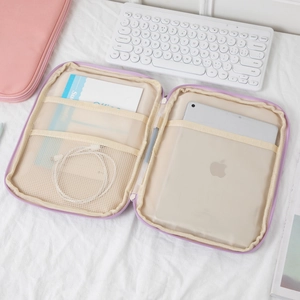 Detail view of purple tablet organizer bag with multi-functional pockets and zipper closure