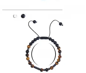 Détails des perles oeil de tigre 6mm et pierres mates sur bracelet réglable code morse