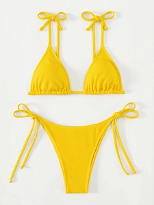 Detailed view of yellow ribbed bikini set with tie-up triangle top and high-cut bottom