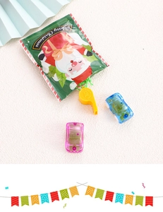 Detailed Christmas toy set with a whistle, two pull-back cars and Santa Claus gift bag
