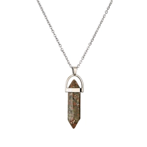 Detail of hexagonal green and red natural stone pendant on a silver metal chain necklace