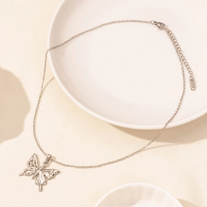 Close-up of silver butterfly pendant necklace showing S925 hallmark and lobster clasp