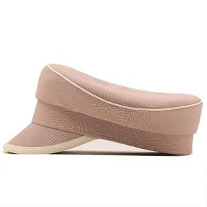 Detail of pink sailor cap with textured lizard pattern and off-white trim detail