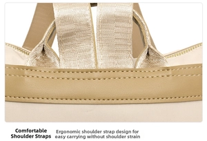 Close-up of reinforced shoulder strap stitching on a minimalist beige leather backpack
