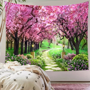 Close-up of vibrant forest path and pink cherry blossom print on wall tapestry