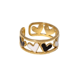 Gold stainless steel open heart ring with black and white enamel heart details