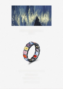 Macro detail of S925 black gold ring featuring rainbow baguette-cut gemstones