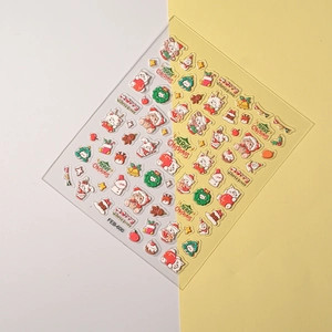 Detailed 5D embossed nail stickers featuring festive Christmas cats and holiday patterns