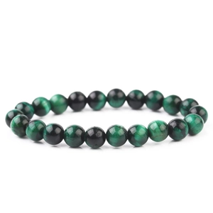 Macro shot of high quality 8mm round natural green tiger eye beaded stretch bracelet