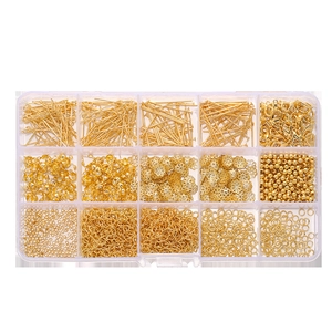 Detailed view of 15-grid organizer box with gold DIY jewelry making findings and lobster clasps