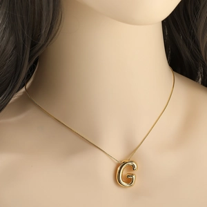 3D balloon letter G pendant in polished gold finish with box chain for women