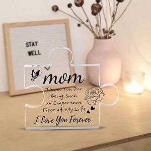 Close-up of acrylic puzzle piece for Mom with heartfelt message and floral design