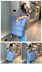 Detail view of the blue large capacity travel bag with wheels and expandable bottom layer