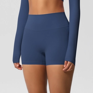 Close-up of high-waist yoga shorts in matte navy blue with premium brushed texture