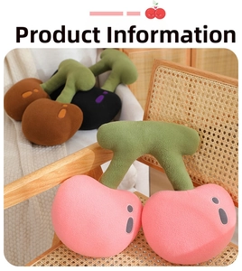 Close-up of soft cherry plush pillows in pink and brown on a cozy wicker chair