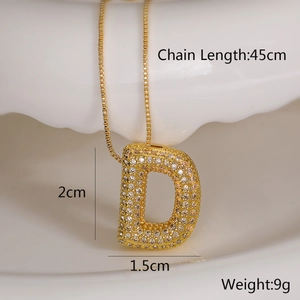 Detailed size specifications for a gold D-letter pendant necklace with cubic zirconia